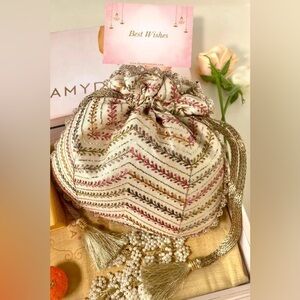 Chic Embroidered Drawstring Clutch